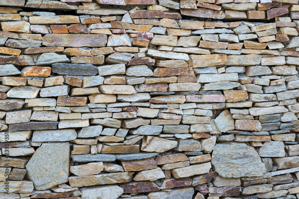 Fototapeta premium Detail of Medieval stone wall, background