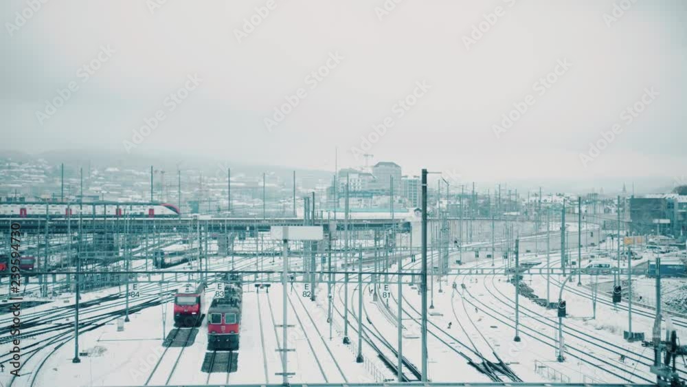 Trains and railway tracks in snow. Zurich, Switzerland Trains and railway tracks in snow. Zurich, Switzerland