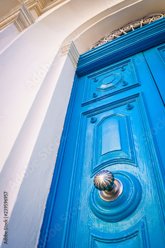 Blue door detail of clasic house entrance