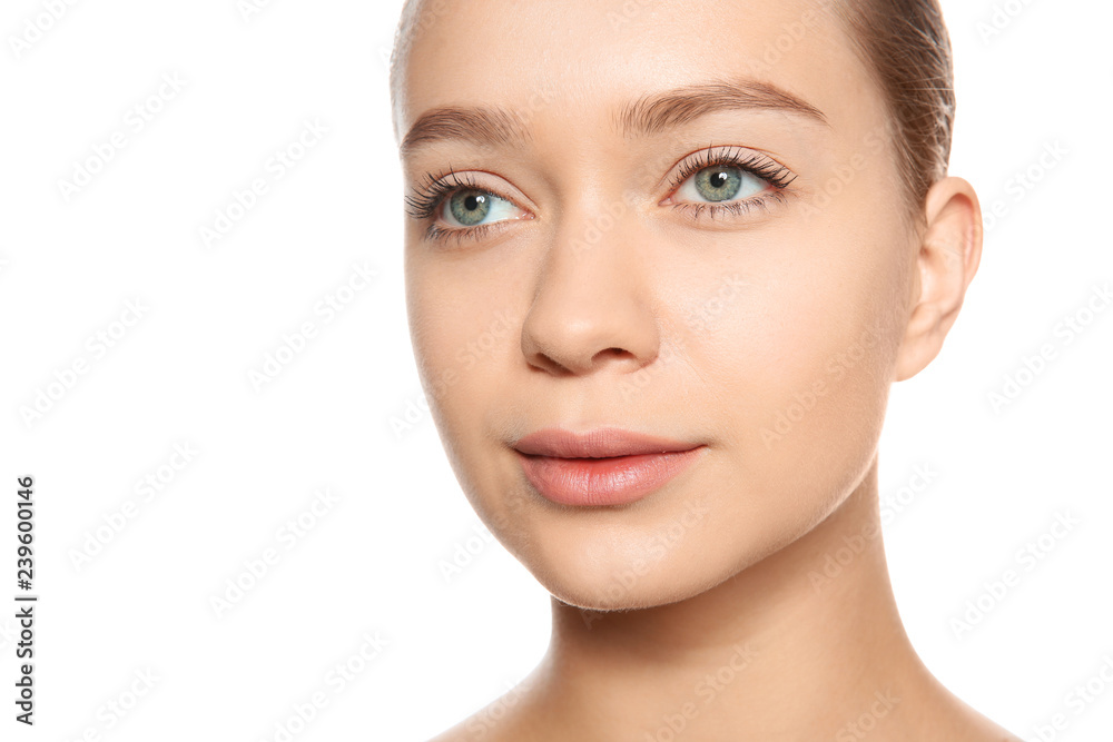 Portrait of young woman with foundation on her face against white background Portrait of young woman with foundation on her face against white background