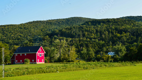 red barn along vermont countryside
