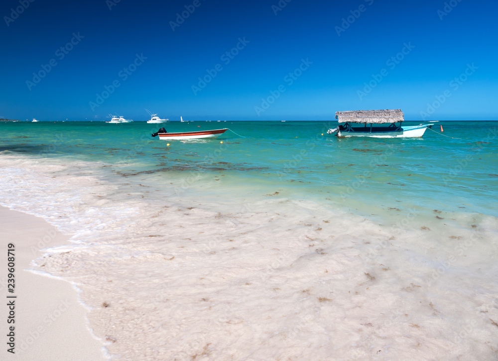 Caribbean destinations with boats in the sea Caribbean destinations with boats in the sea