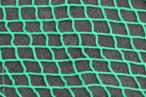 Green net on black background