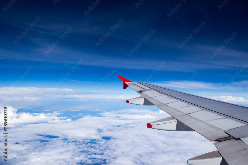 Looking out the window at the wing of the plane Looking out the window at the wing of the plane