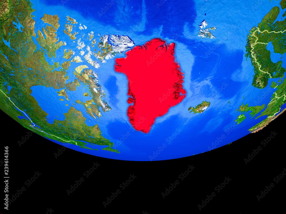 Greenland from space on model of planet Earth with country borders.