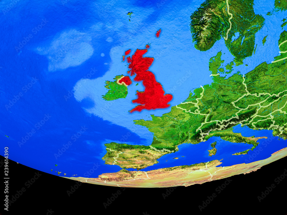United Kingdom from space on model of planet Earth with country borders.