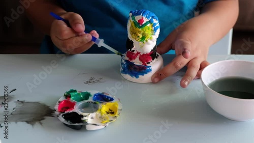4k Video Children Are Coloring Plaster Dolls