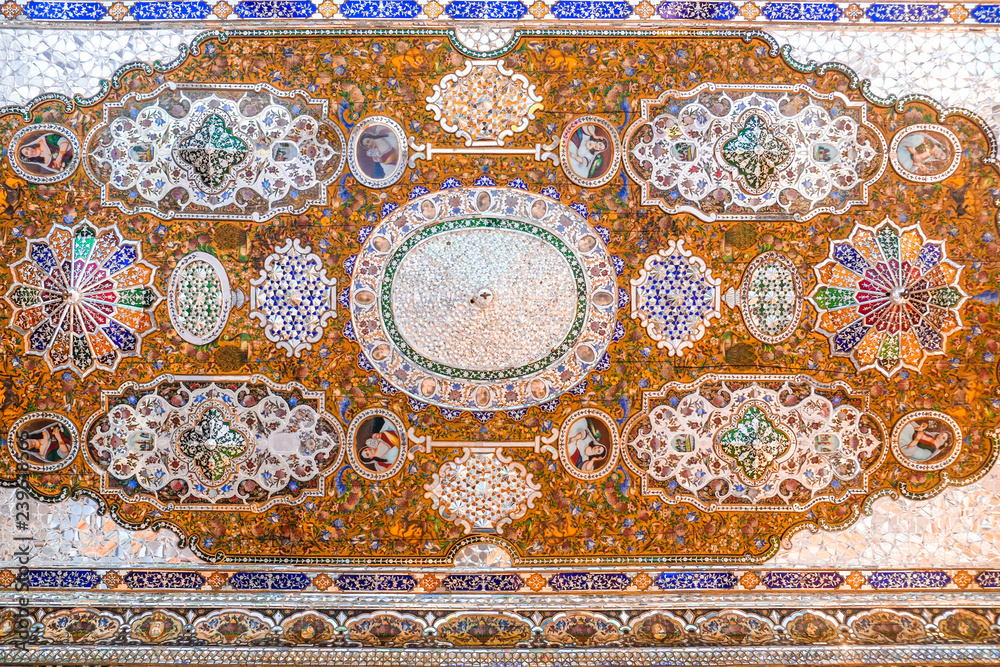 Shiraz, Iran. October 24, 2016 : Beautiful  ceiling of the Qavam House or Narenjestan e Ghavam, embellished with mirror tiles work and wood painting.