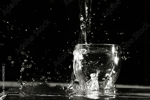 Water splash from the transparent glass