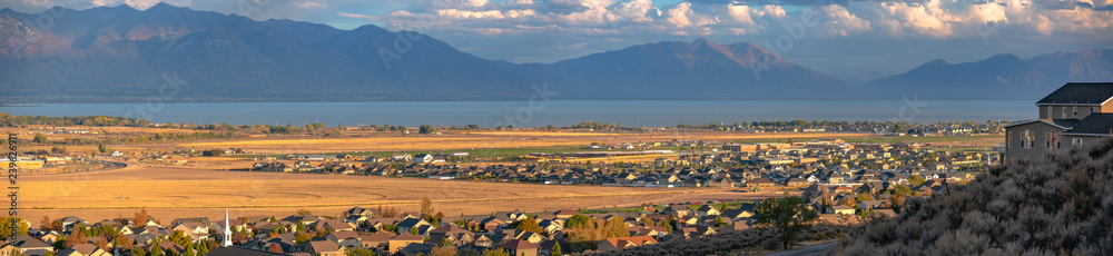 Panoramic view of homes lake and mountain in Utah