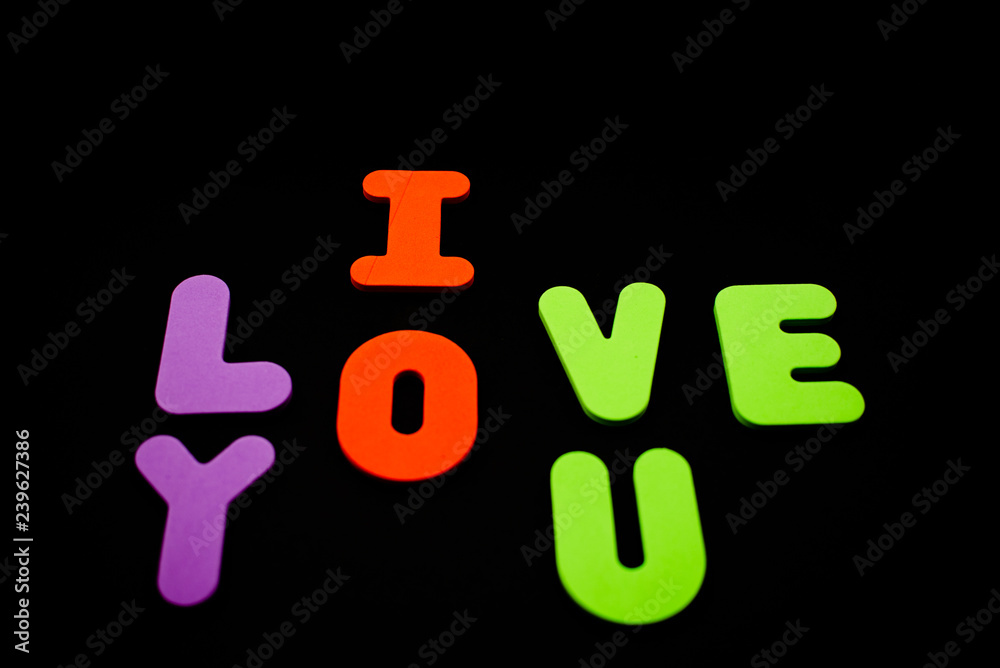 Foam English aphabet letters. I love you with bright letters. Saint Valentine 14 February Concept. Foam English aphabet letters. I love you with bright letters. Saint Valentine 14 February Concept.