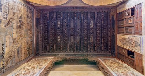 Wooden ceiling decorated with floral pattern decorations, mural, and built-in wooden cupboards at ottoman historic Beit El Set Waseela building (Waseela Hanem House), Old Cairo, Egypt photo