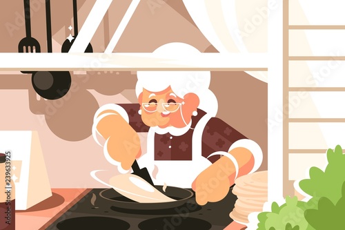 Grandma in kitchen cooking dinner