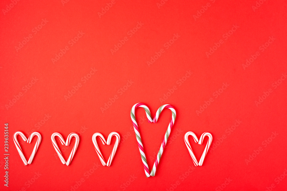 Red background with candy cane.