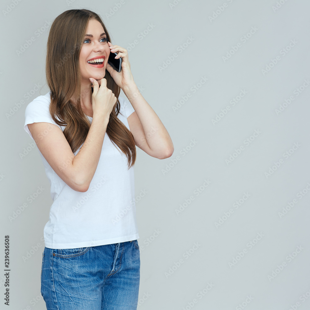 happy woman talking on a cell phone. happy woman talking on a cell phone.