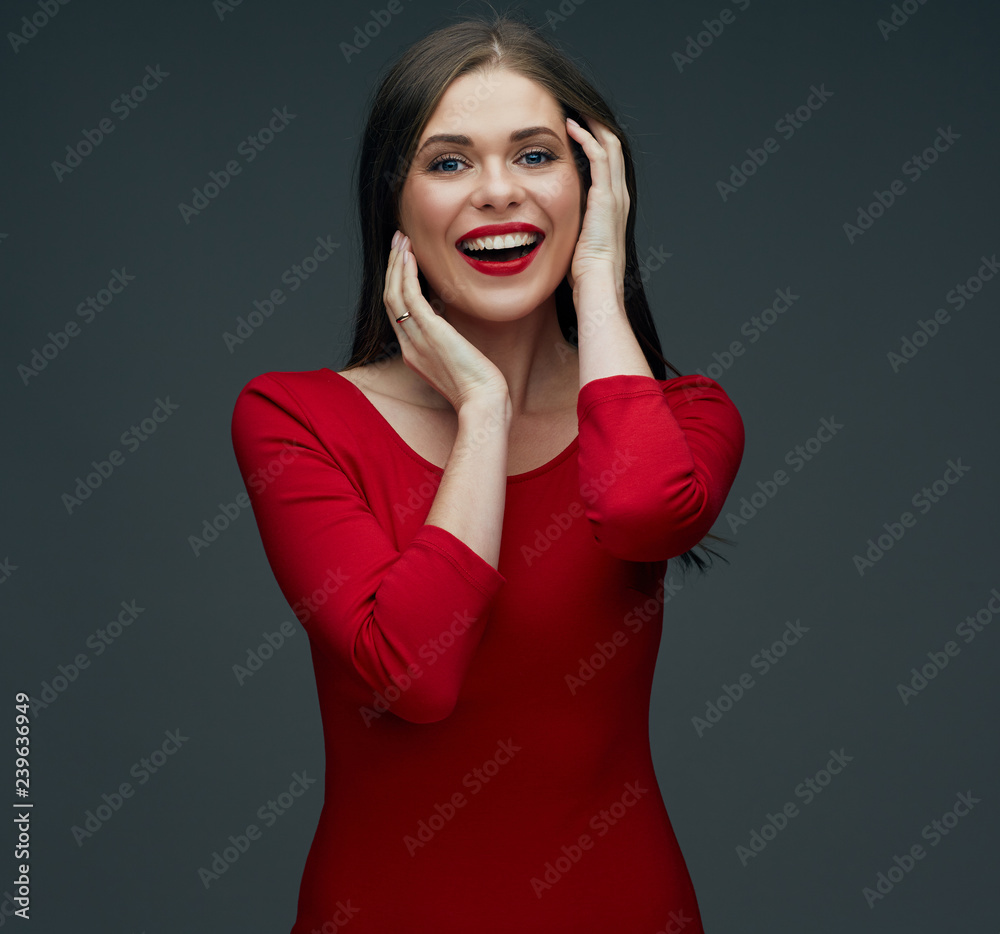 smiling woman touching her face. smiling woman touching her face.