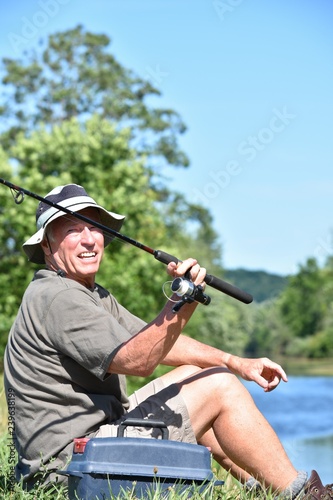 Old Senior Male Fisherman And Happiness With Fishing Rod Casting Rod