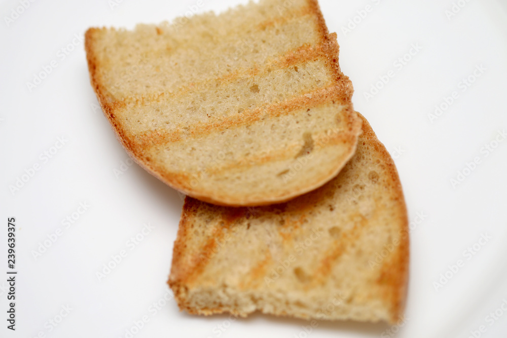 Bread of fried croutons on a white background Bread of fried croutons on a white background
