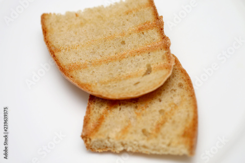 Bread of fried croutons on a white background