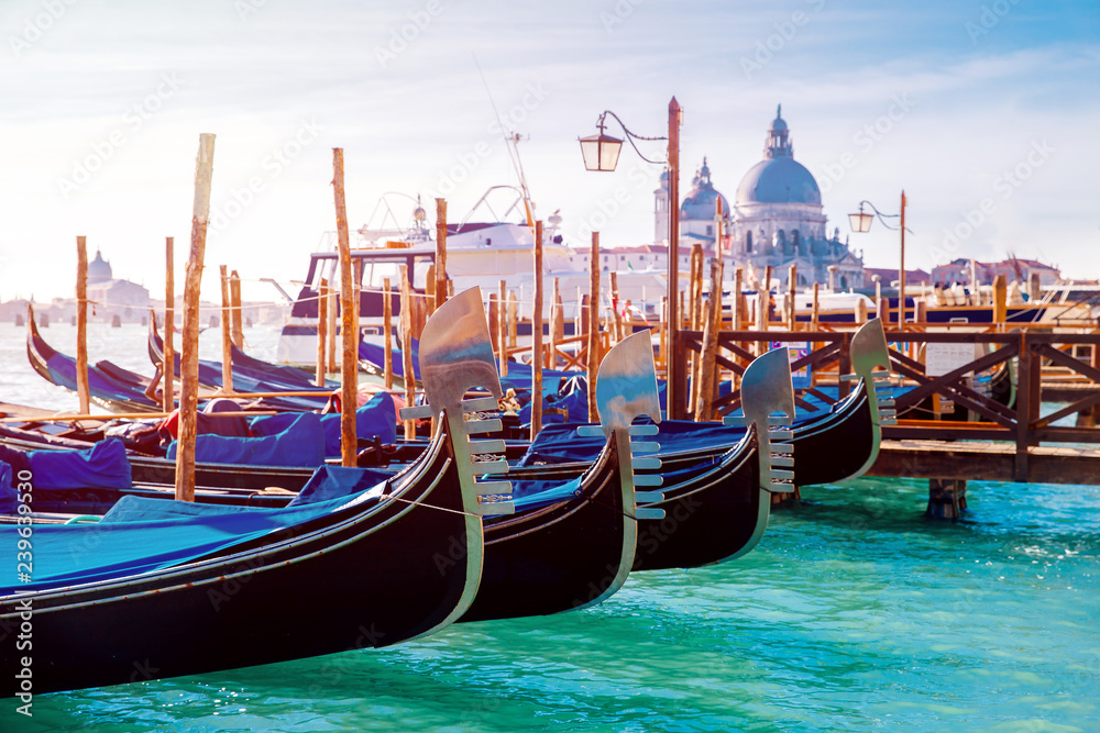 Canal with gondolas in Venice, Italy. Sunny day. romantic travel.