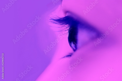 Wallpaper Mural vertical eye closeup on purple neon light Torontodigital.ca