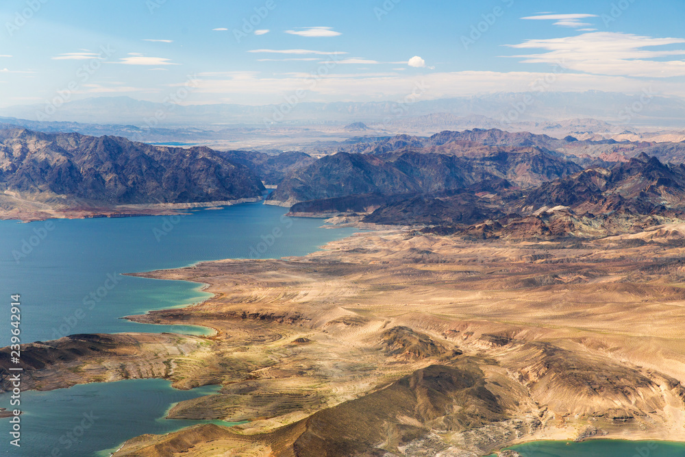 Fototapeta premium landscape and nature concept - aerial view of grand canyon and lake mead from helicopter
