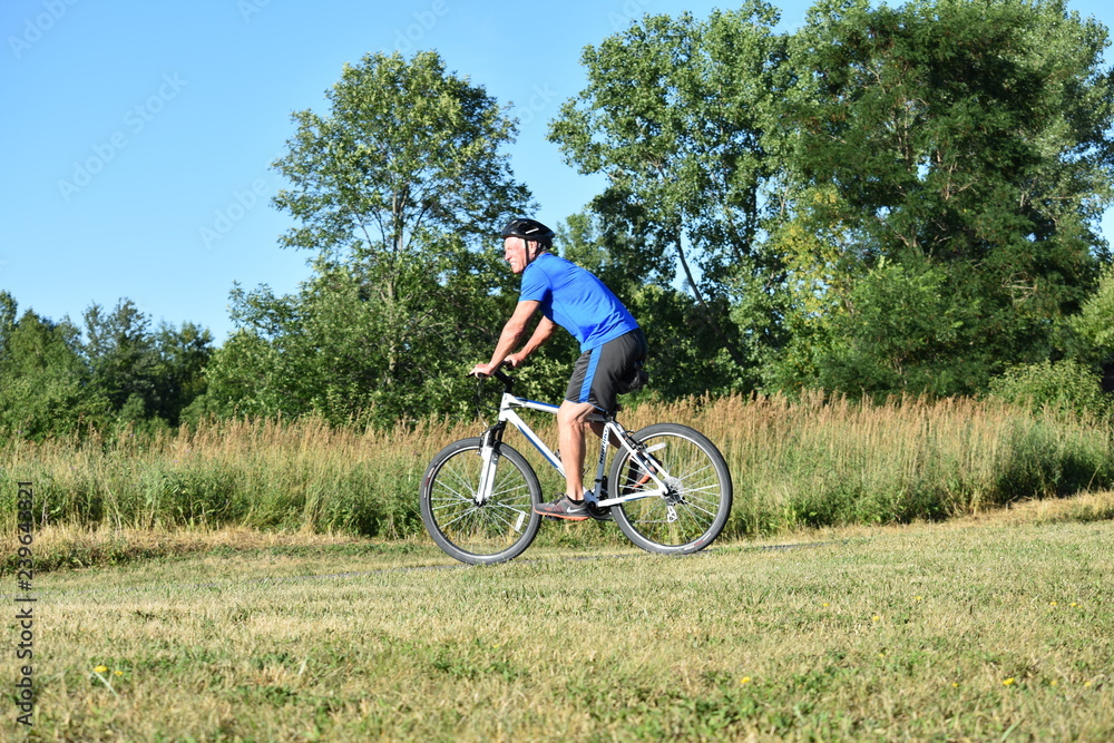 Male Cyclist And Exercise Wearing Helmet Exercising Male Cyclist And Exercise Wearing Helmet Exercising