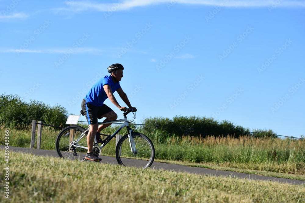 Athlete Retiree Male Cyclist Working Out Wearing Helmet Riding Bike Athlete Retiree Male Cyclist Working Out Wearing Helmet Riding Bike