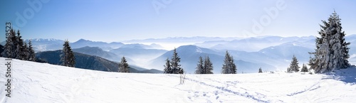 Panorama of snowy winter mountain, Alpine mountains in winter, Beautiful winter snowy mountains