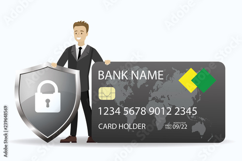 Young caucasian businessman holding credit card and shield with padlock