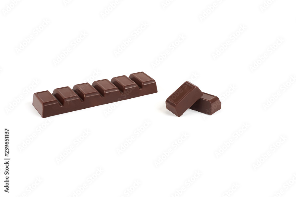 Close-up pieces of chocolate bar with filling isolated on white background. Close-up pieces of chocolate bar with filling isolated on white background.