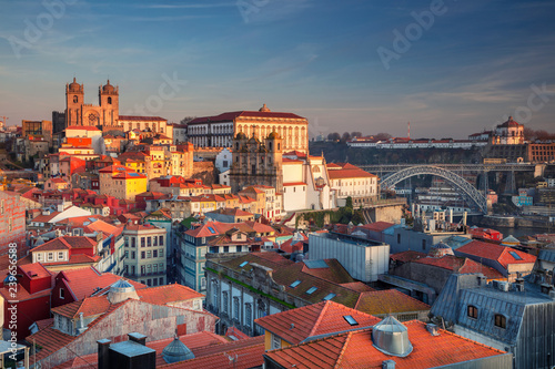 Porto, Portugal. Aerial cityscape image of Porto, Portugal with the Porto Cathedral and old town during sunset. 