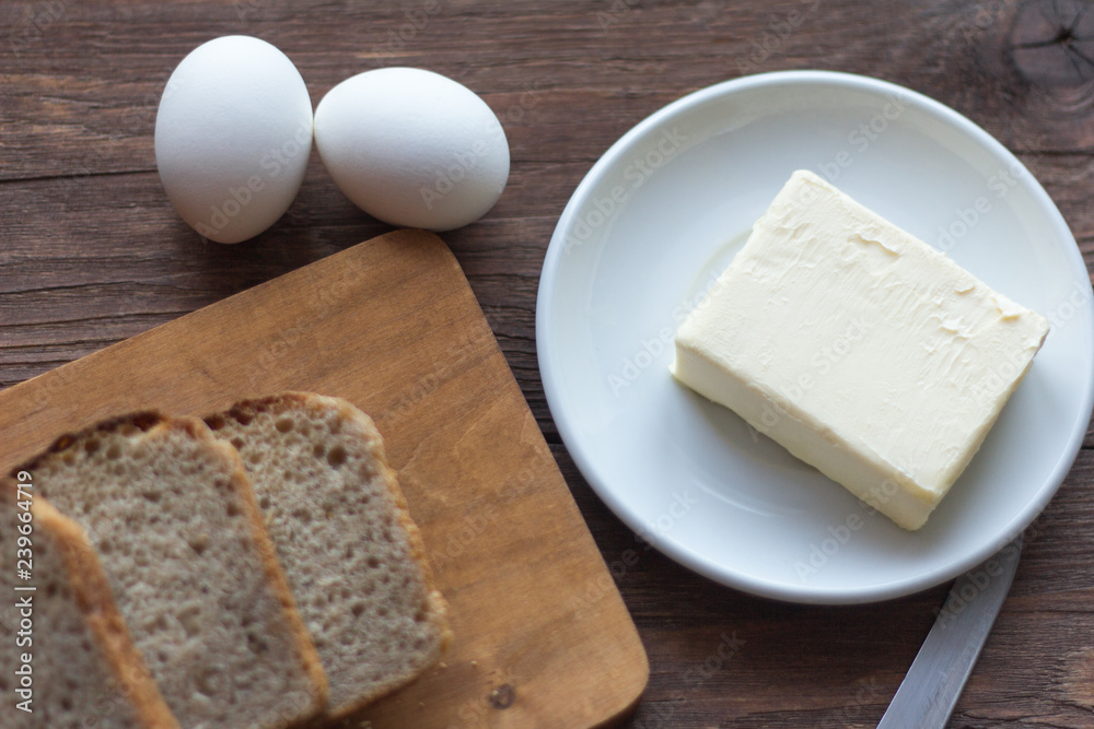 rye bread with butter and boiled eggs on the village table rye bread with butter and boiled eggs on the village table