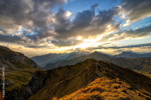 Beautiful sunset shot of majestic Dolomites mountains in Italian Alps. Landscape shot of high rocky mountains in the the Italian Dolomites during Autumn time.