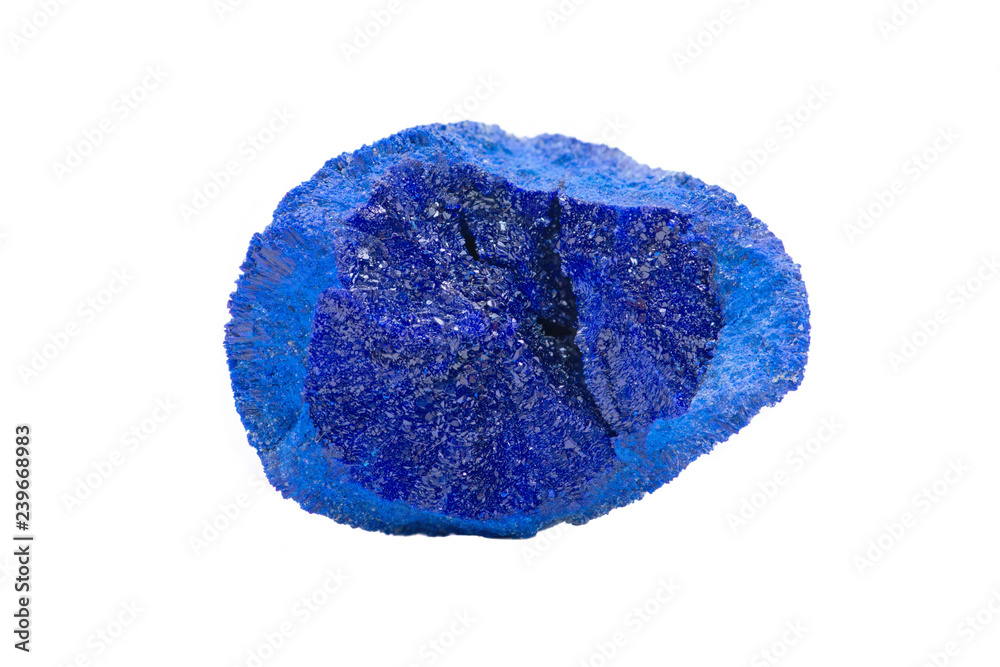 Dark blue druse covering the inside of Azurite Partial Nodule from Russia, isolated on white background. Dark blue druse covering the inside of Azurite Partial Nodule from Russia, isolated on white background.