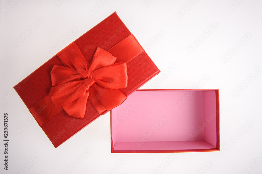 Open Gift box with Red ribbon bow isolated on white background Open Gift box with Red ribbon bow isolated on white background