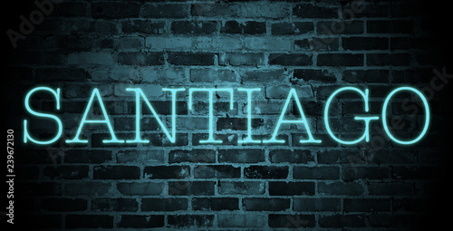 first name Santiago in blue neon on brick wall © christopher-oliver