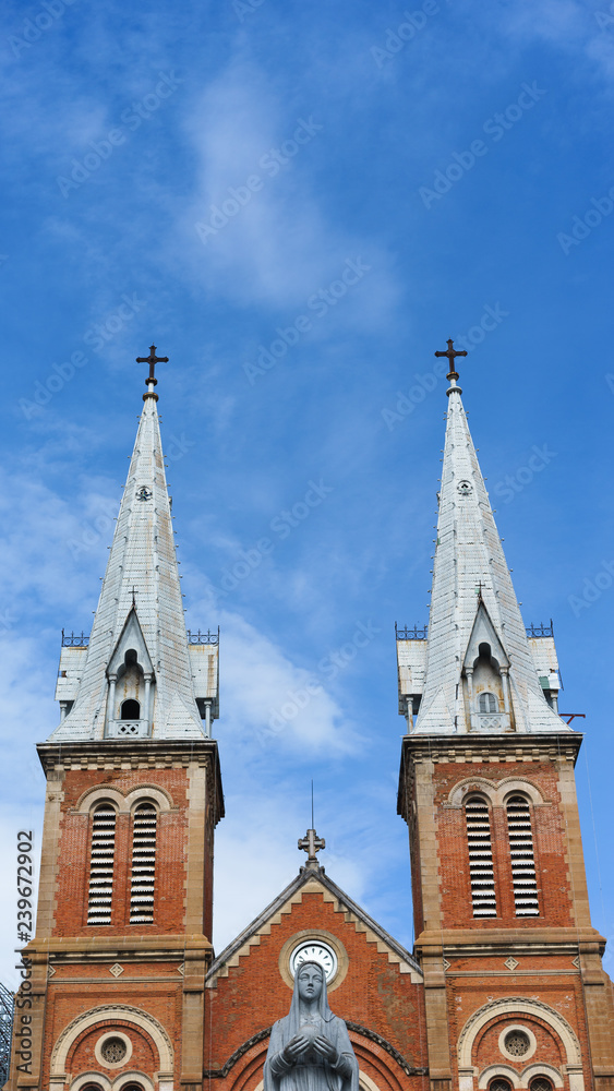 Saigon Notre-Dame Cathedral Basilica on blue sky background in Ho Chi Minh city, Vietnam