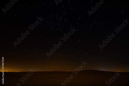 Night sky with stars above arabian desert