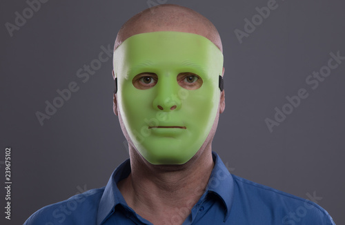 man in an alien mask © serikbaib