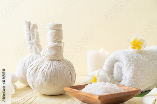 Spa herbal compressing ball with candle and orchid