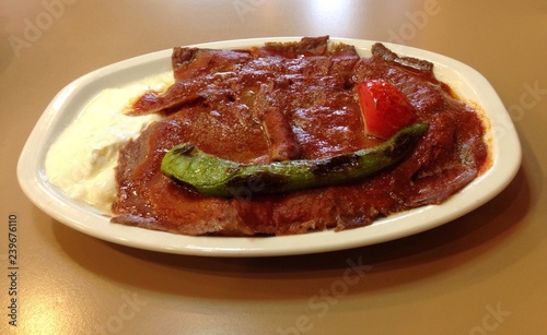Iskender, translated as Alexander (the Great) Kebab is a well known ultra high caloric gourmet Turkish dish of Bursa made from high quality beef and typically enjoyed with yogurt and melted butter