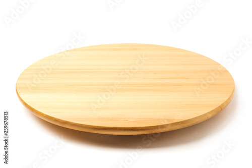 Bamboo or wooden rotating tray isolated on white background. photo