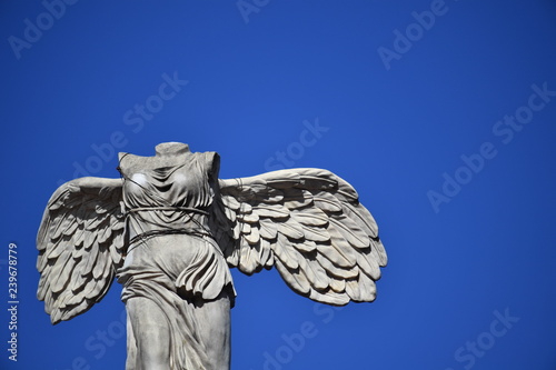 Konstfotografi An old andstone sculpture of a headless angel.