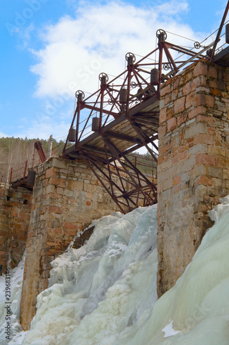 Hydro power plant Porogi (Thresholds) Big Satka river at winter photo