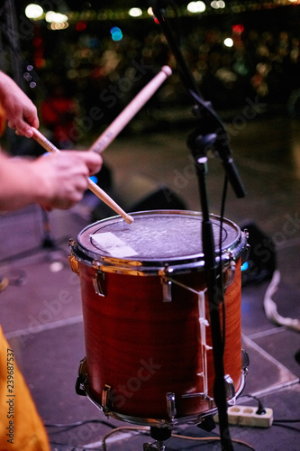 drummer in action. A photo close up process play on a musical instrument
