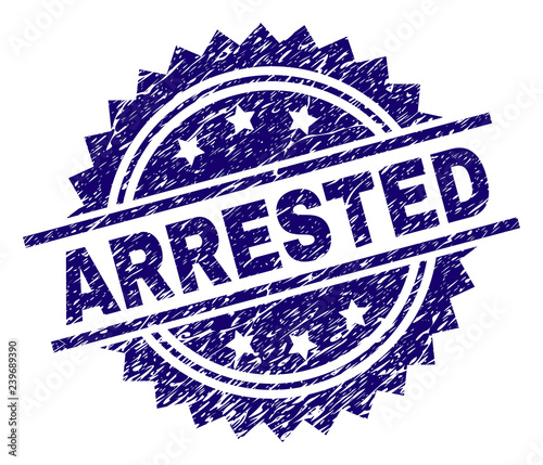 ARRESTED stamp seal watermark with distress style. Blue vector rubber print of ARRESTED caption with corroded texture.
