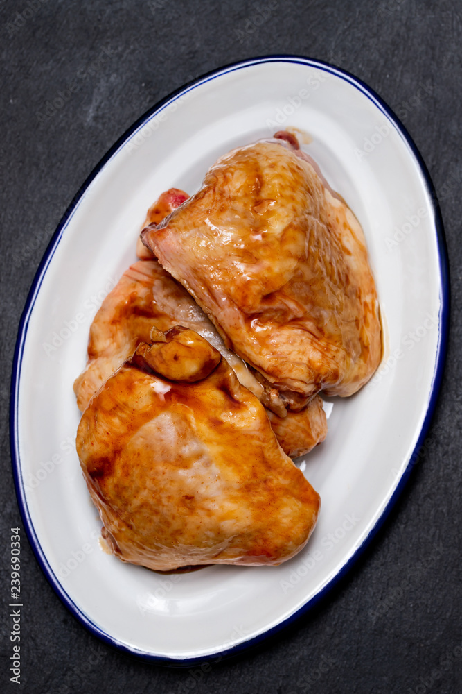 chicken with marinate on dish chicken with marinate on dish
