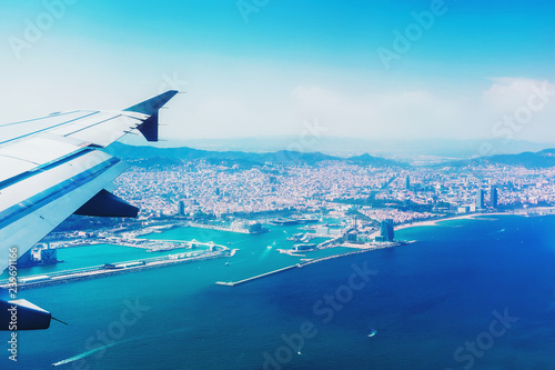 Landing in Barcelona, Spain, Catalonia. Traveling by air. View from airplane window.
