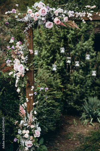 Wedding table decoration in rustic style. Wedding flowers.